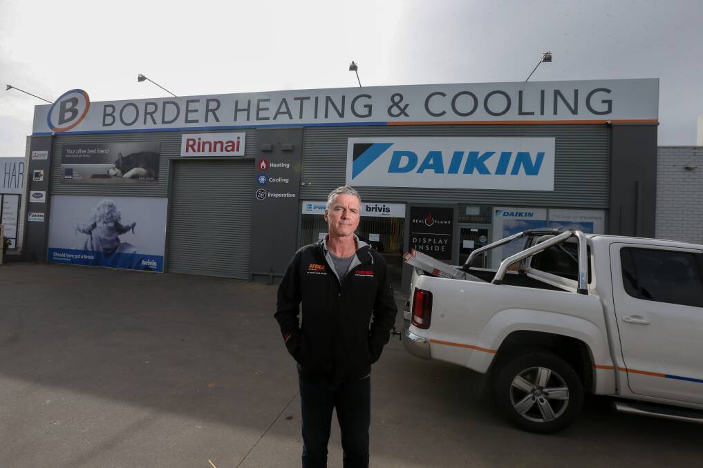 David Sinclair in 2020 after being forced to temporarily close Border Heating and Cooling on South Street in Wodonga due to COVID isolation rules. File picture