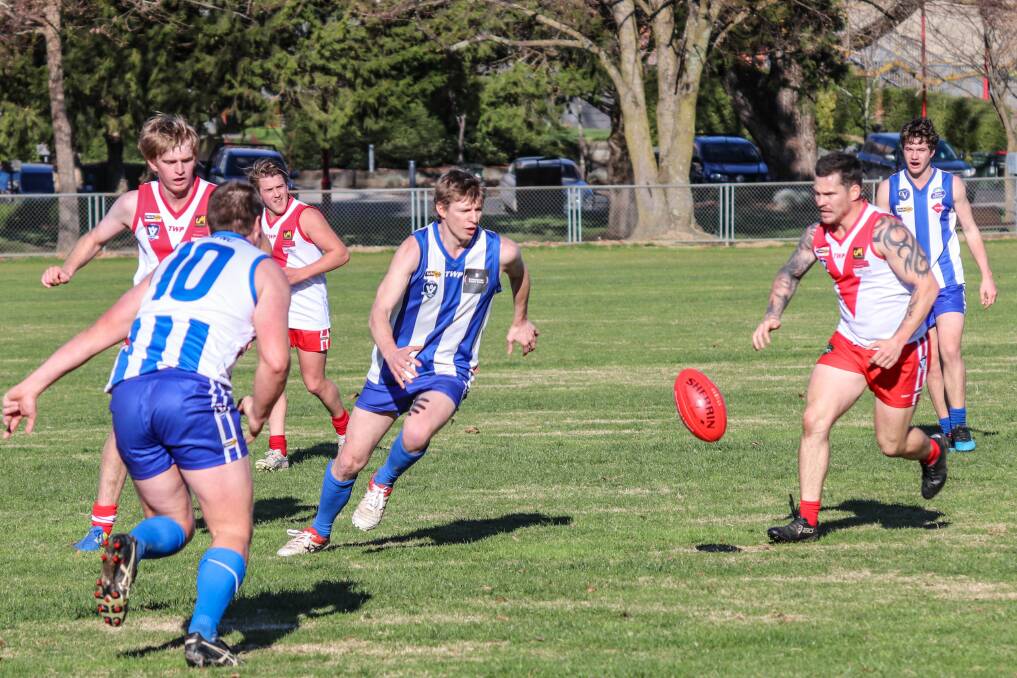FOCUSED: Tumbarumba coach Quinn Rooney only has eyes for the ball in his side's clash against Federal at Tumbarumba on Saturday. Picture: WENDY LAVIS