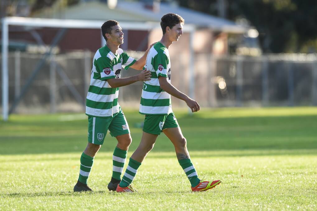 FRENCH CONNECTION: Star Albury United import Gauthier Robin congratulates Adam McLennan on a goal. Picture: MARK JESSER