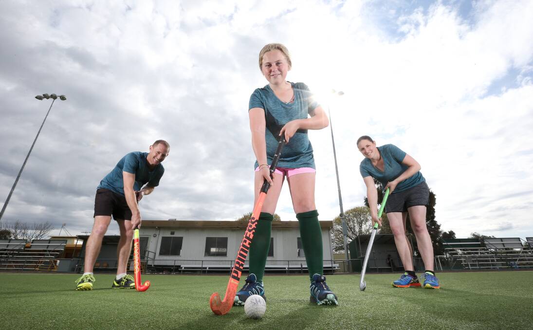 CHANGE OF SEASON: Rodger Anstis, Avie Liley, 14, and Maddy Poulton are all ready to tackle Hockey Albury-Wodonga's twilight competition. Picture: KYLIE ESLER