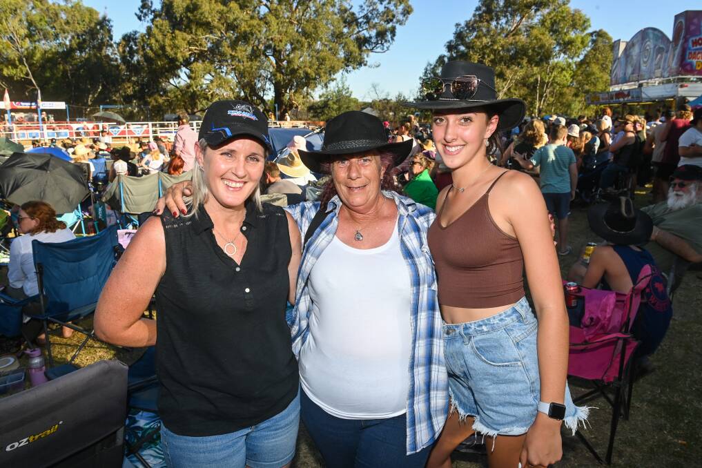 LIVE ACTION: Wangaratta's Kassi Fitzpatrick, Wendy Neate and Heidi Fitzpatrick were thrilled to be at the Kinross Country Rodeo after the rodeo planned for Wangaratta was cancelled. Picture: MARK JESSER