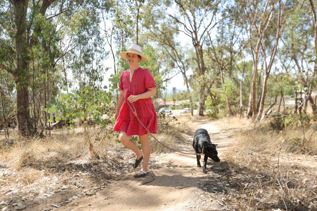 Albury resident Sheila Smith with her dog Remi near the scene of the dog attack they experienced on February 1. Picture by James Wiltshire