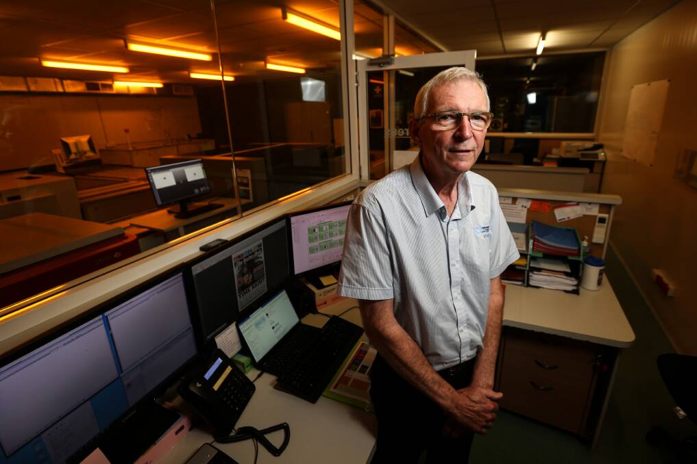 PRINT PROFESSIONAL: Pre-press operator Neville Oliver will retire after 40 years on the Border under seven different business owners. He's helped print many newspaper titles, including The Border Mail. Picture: JAMES WILTSHIRE