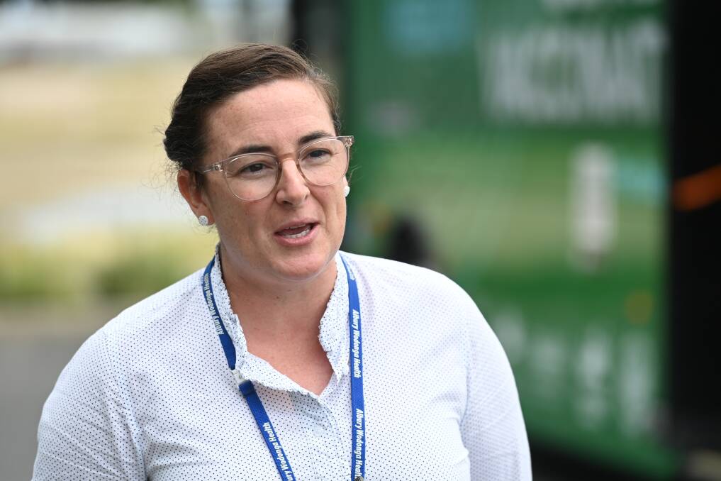 UPBEAT: Albury Wodonga Health vaccination program project manager Jess Amy was pleased to see a strong response at Bunnings Warehouse in Wodonga. Picture: MARK JESSER