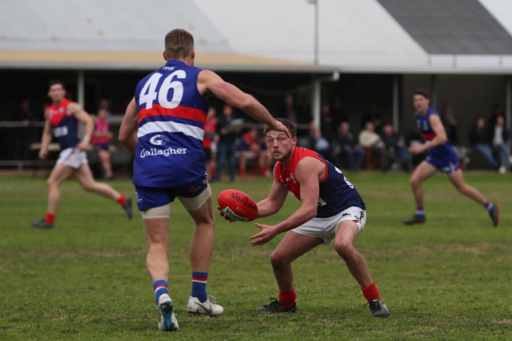 COUNTRY SPIRIT: Bright rallied in support of injured Milawa player Bryce Mortimer by donating the proceeds of the club's draw after he suffered a badly broken leg on Saturday. Picture: WANGARATTA CHRONICLE