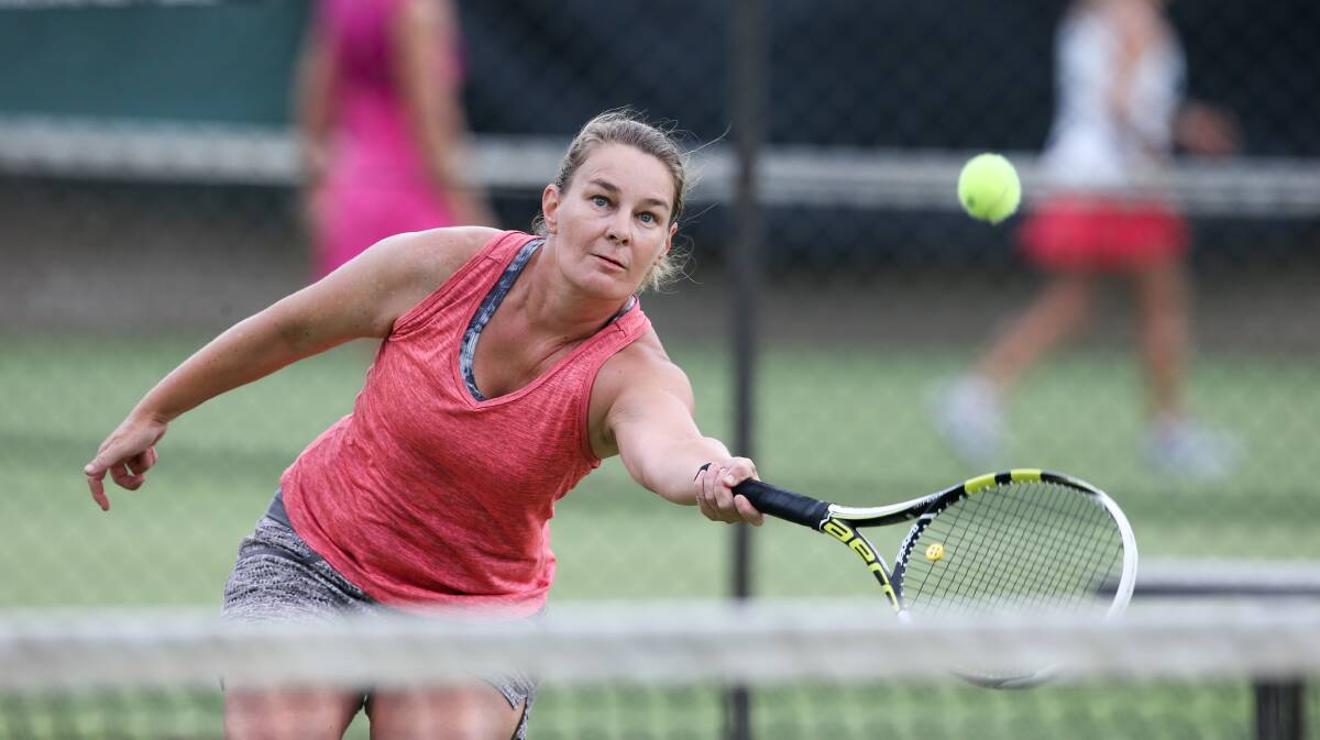 FOCUSED: Albury's Sally Yea hits a volley during Tuesday ladies pennant tennis action. Picture: KYLIE ESLER