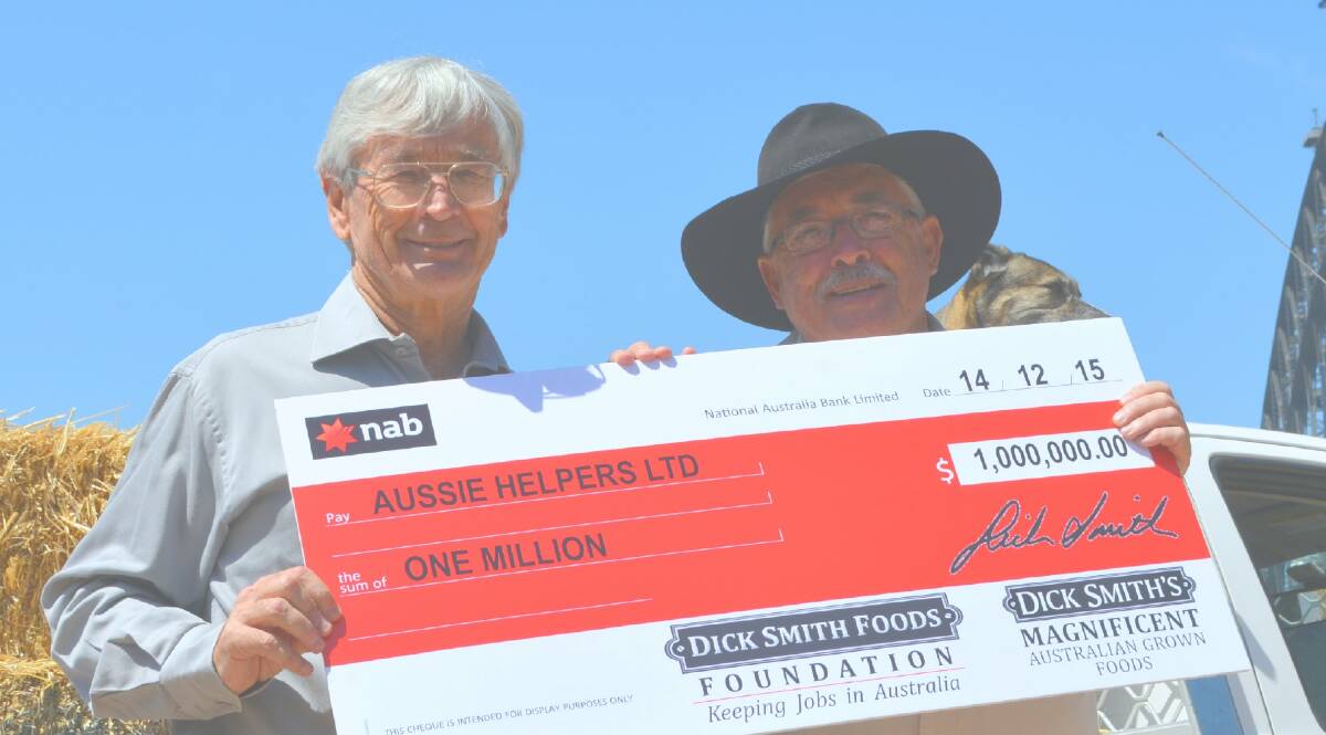 Drought-hit farmers get an early present this Christmas. At a media event in the shadow of the Sydney Harbour Bridge Dick Smith presents farm charity Aussie Helper founder Brian Egan with a whopping donation. 
