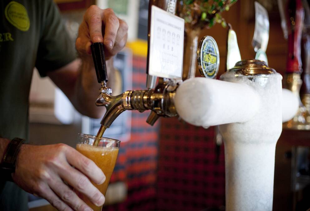 A file image of beer on tap. The federal government has publicly announced lowering taxes on draught beer. Picture: FILE PHOTO