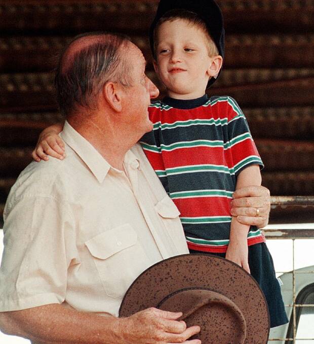Tim Fischer, with son Harrison, pictured in 1999 when he and wife Judy decided to share the story of Harrison's autism in a bid to raise awareness in the community.