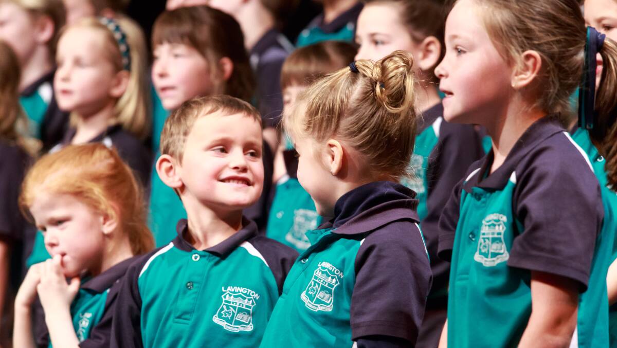 HAPPY DAYS: Lavington Primary School students perform in the primary school choirs category at last year's Albury Wodonga Eisteddfod. The catalogue for this year's event is out now, with a solo artist challenge event added for 2018.