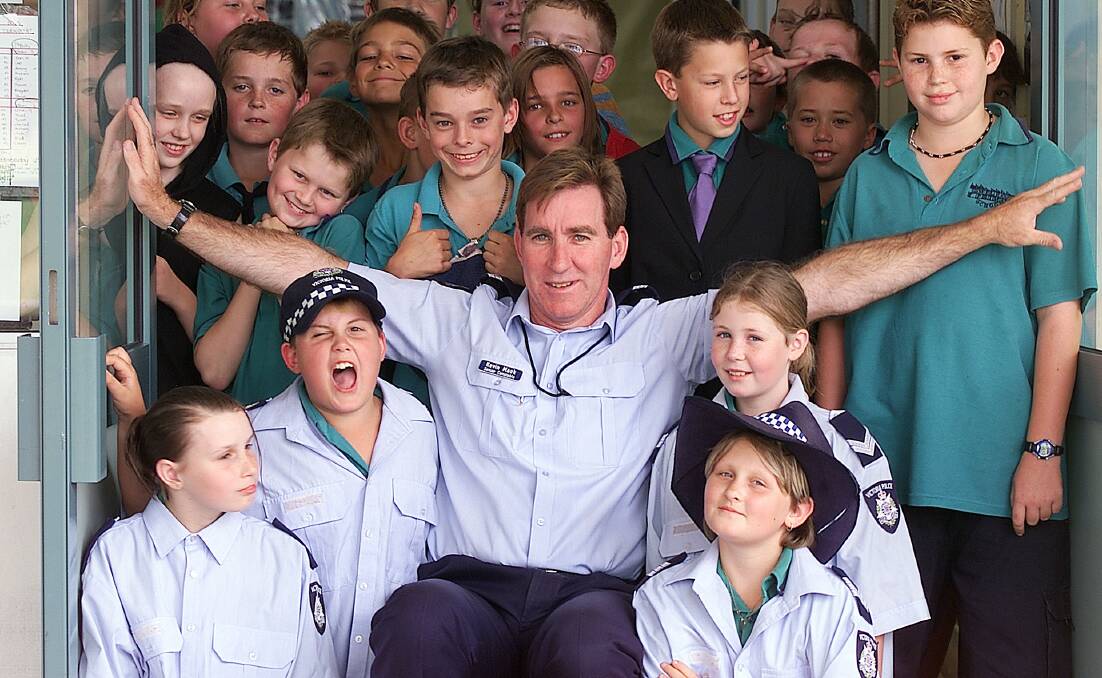 KING OF THE KIDS: Senior Constable Kevin Mack - as he was back in 2002 - taking part in a school visit as part of the Police in Schools program.