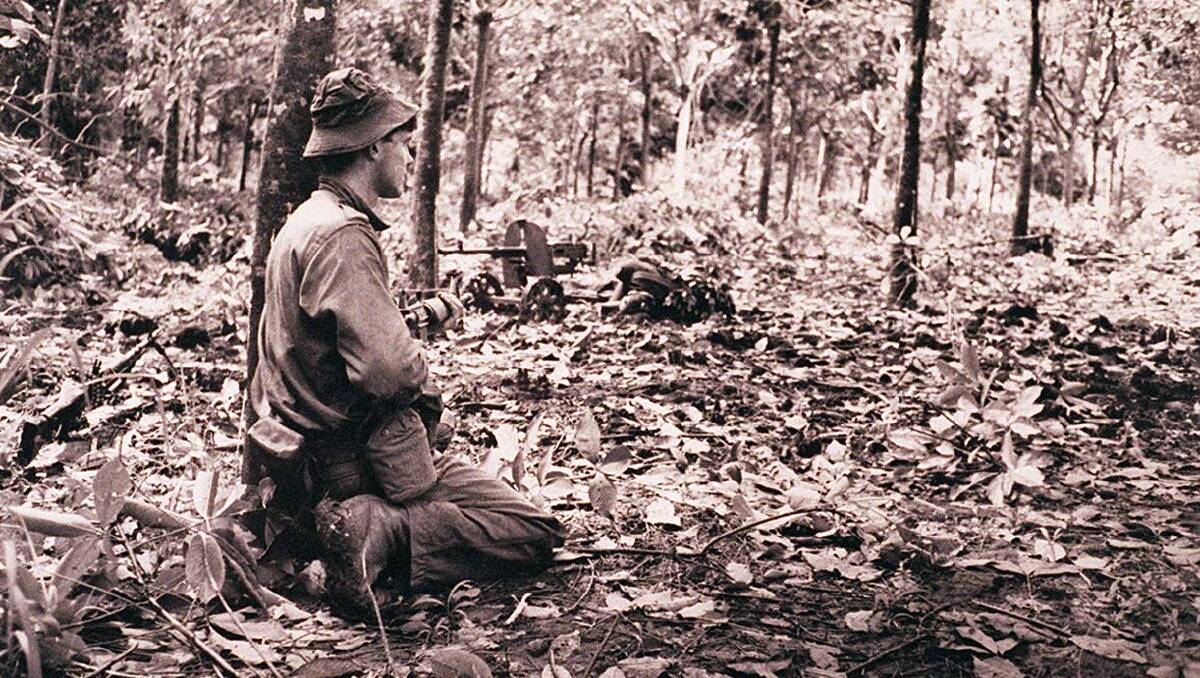Australian soldiers during the Battle of Long Tan in Vietnam on August 18, 1966. The battle was the bloodiest, if not the biggest, battle of Australia's involvement in the Vietnam War. Picture: AAP/COURTESY OF THE AUSTRALIAN WAR MEMORIAL