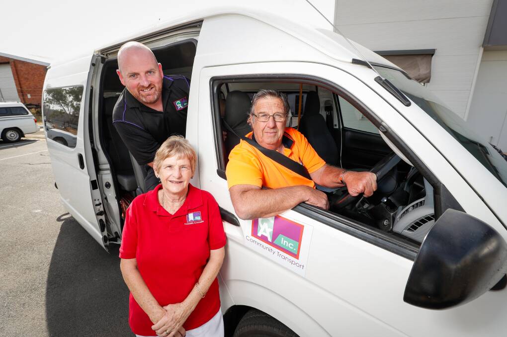 GET ON BOARD: Community Accessability operations manager Aidan Kilroy hopes more people put up their hand to drive for the community transport program, like Nola Davies and Brian Pieper. Picture: JAMES WILTSHIRE