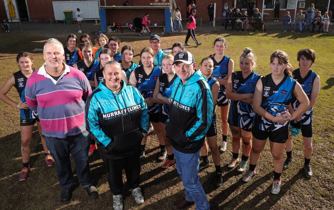 MORE RESPECT: Grants officer Paul Somerville, committee member Nadine Nicholson and Rutherglen Cats president Patrick Beattie with players at Barkly Park. Facilities are in need of upgrade. Picture: JAMES WILTSHIRE