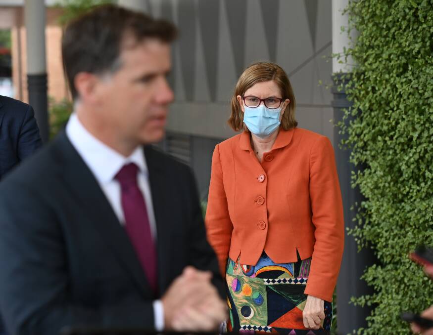 KEEP YOUR DISTANCE: Professor Kerry Chant, with member for Albury Justin Clancy in the foreground, at Albury Wodonga Health yesterday. Picture: MARK JESSER
