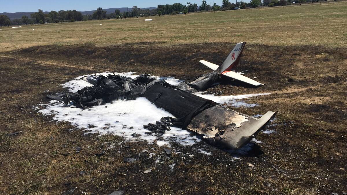 All that remains of the plane after it burst into flames after a crash landing at Wangaratta airport. Picture: BLAIR THOMSON