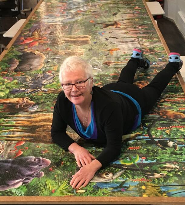 WORK OF ART: Anne Tempest's jigsaw took three-and-a-half years, though she admits she wouldn't allow anyone to help. The jigsaw, which weighs over 100 kilograms, will hang in the National Zoo and Aquarium in Canberra.