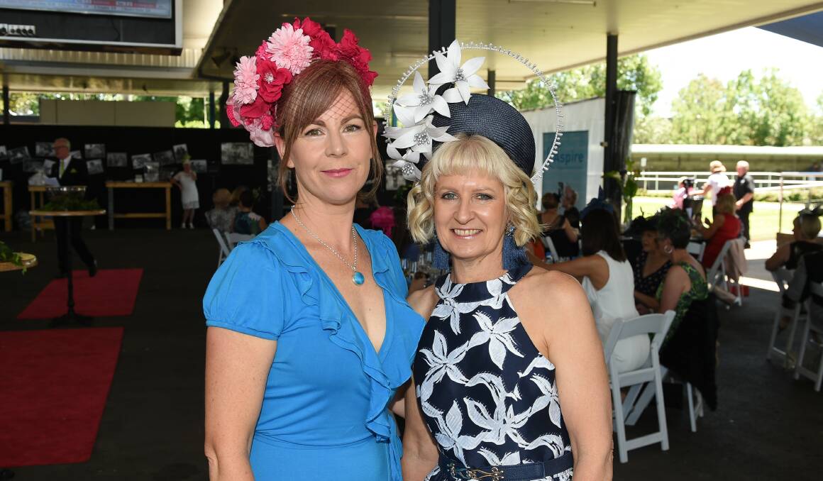 PRIZE WINNERS: Among stiff competition, Tammy Nelson and Margaret Singleton earned praise from the luncheon judges for their hat and outfit respectively.