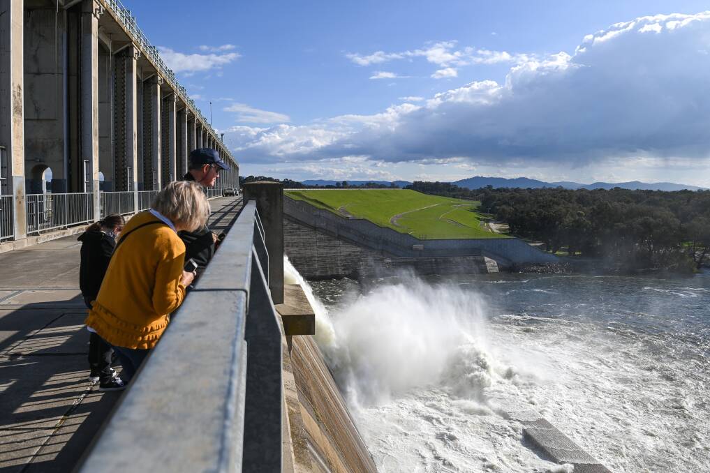 QUITE THE SIGHT: Water spilling from the Hume Dam Wall in September last year.