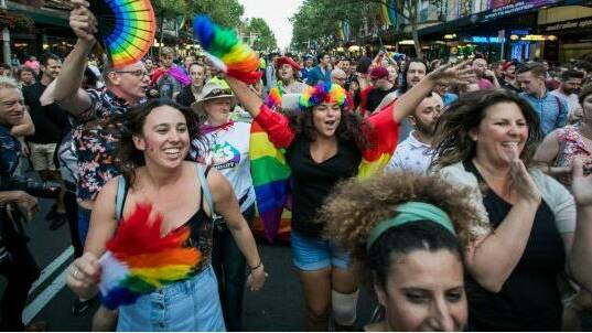 Yes voters celebrate the same-sex marriage postal survey outcome on Oxford Street in Sydney last week. Photo: Anna Kucera