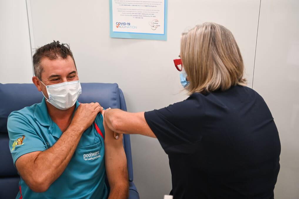 ROLL-OUT: Rob Hudson was one of the first members of the general public to receive a vaccination at the AWH state hub. If you are eligible for vaccination, go to portal.cvms.vic.gov.au or call 1800 675 398 to book.