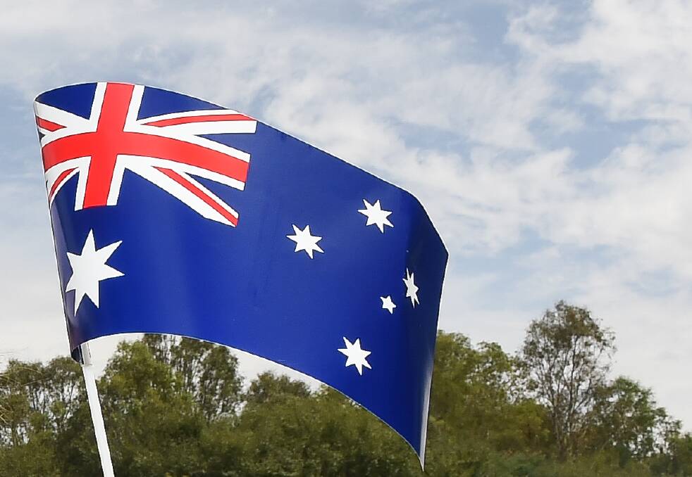 Australia Day events proceed, caution urged
