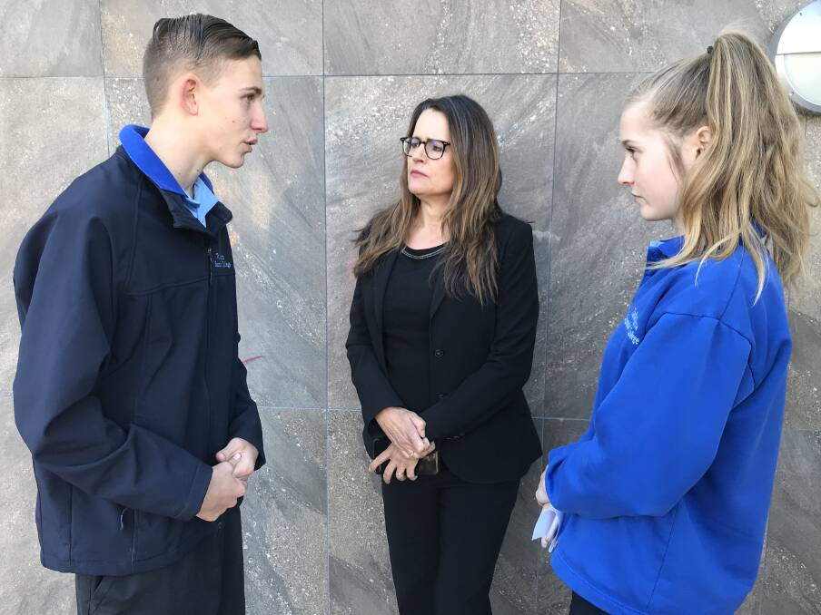 BE AWARE: Tallangatta High School year 10 students Jack Fenz Mace, 15, and Megan Gouge, 16, speak to Collective Shot co-founder Melinda Tankard Reist at The Cube in Wodonga as part of the Respectful Relationships forum. 