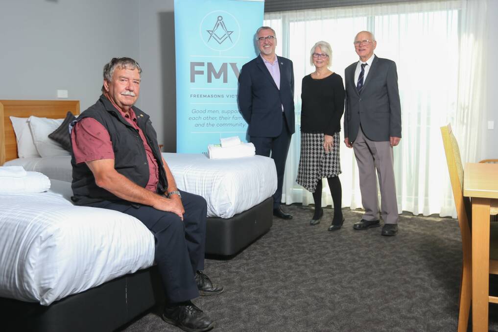 HELP: Freemason Phill Creek, Fight Cancer Foundation's Eric Wright and Hilltop manager Helen Murray, and Freemason George McPherson celebrate the donation from the Myrtleford Masonic Lodge. Picture: TARA TREWHELLA