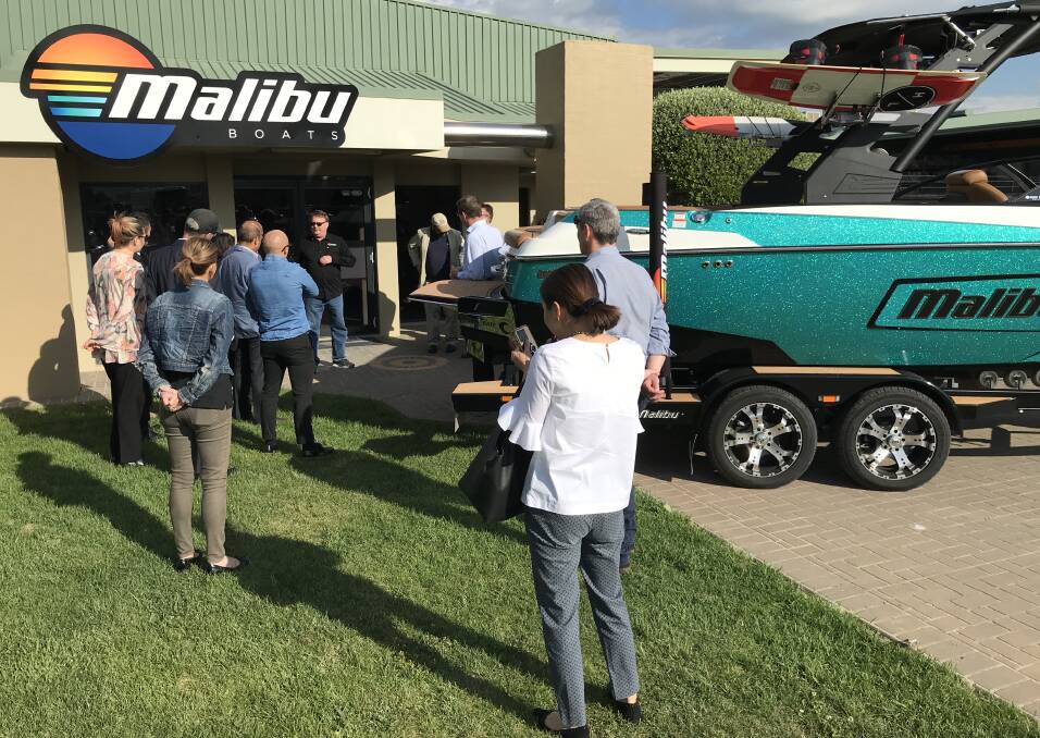 TOUR: Malibu Boats Australia general manager Price Taylor led the delegation on a tour of the Albury factory, which has recently begun exporting to China.