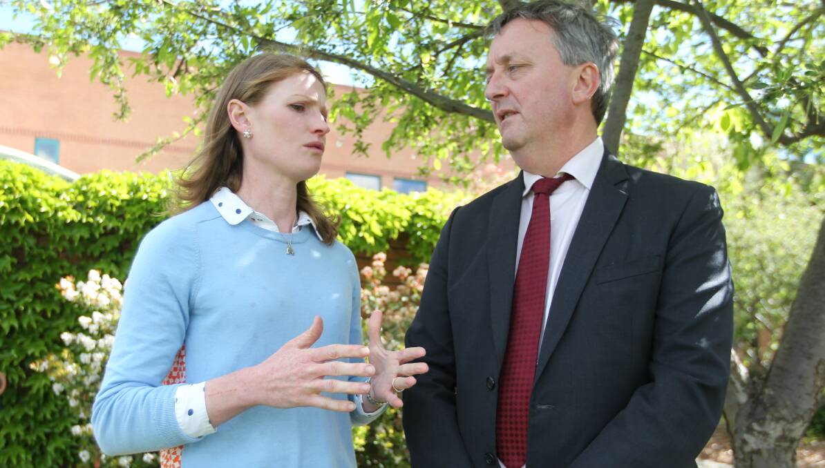 SPEAKING OUT: Tallandoon farmer Alice Colclough speaks to Victorian mental health minister Martin Foley about the dairy price fall-out.