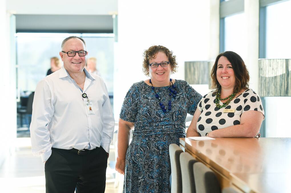 TOGETHER: Goulburn Valley Health's Gordon Ross, part of the lead agency behind Community Interlink, and Albury Wodonga Health's Robyn Gillis and Lucie Shanahan. 18 services have formed to offer home care. Picture: MARK JESSER
