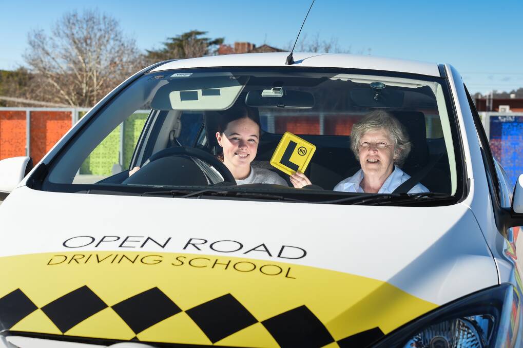 BACK ON THE ROAD: Shaneika Parnell, 17, is getting back into driving lessons with Chris Hill of Open Road Driving School, after COVID-19 restrictions. Tests can be booked from Wednesday in NSW. Picture: MARK JESSER