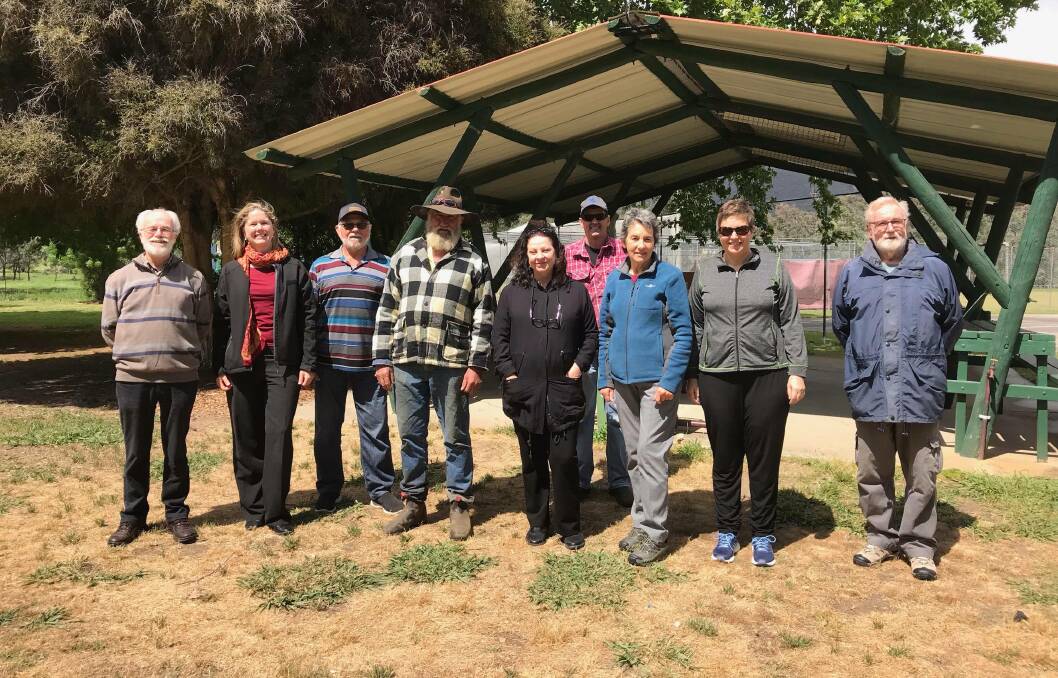 WORKING IN BACKGROUND: The Kiewa Memorial Park Reserve Committee, lead by chairman Merv Fennell (left), has been recognised by DELWP for their work, including a plaque to commemorate the 1918 armistice.