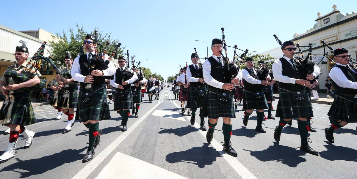 SHOW OF PRIDE: The 5th/6th Battalion Royal Victorian Regiment Pipe Band join with the pipe bands from Albury-Wodonga and Wangaratta at the Federation Festival parade, which returned this year. Picture: JAMES WILTSHIRE