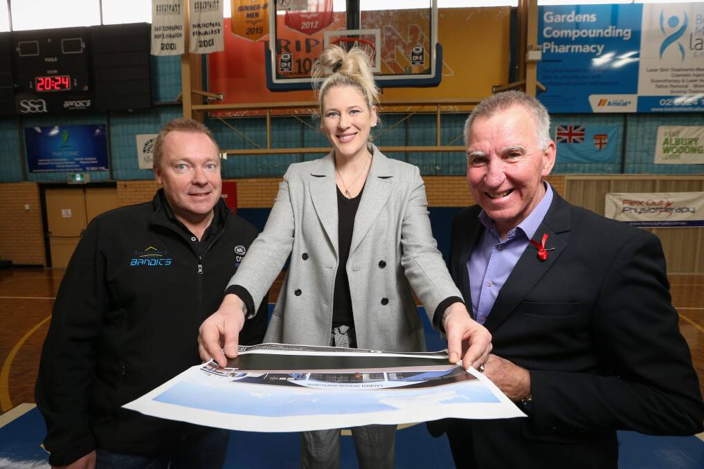 EXCITING: Bandits president Luke Smith, Basketball Hall of Fame inductee Lauren Jackson and Albury mayor Kevin Mack look over plans for the sport centre's upgrade. Picture: JAMES WILTSHIRE