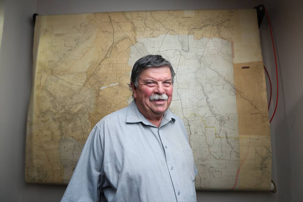 RESTORED: Glenn Colwell helped create this map of the Yackandandah Shire in the 1960s. A team from the University of Melbourne's Grimwade Centre for Cultural Materials Conservation spent a week restoring the map. Picture: MARK JESSER