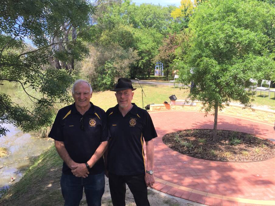 PROJECT FINISHED: Rotary Club of Albury Hume secretary Dennis Martin and president Stephen O'Connell at the opening of their "Reflection Area" in South Albury. The space at Browns Lagoon is dedicated to past Rotarians.