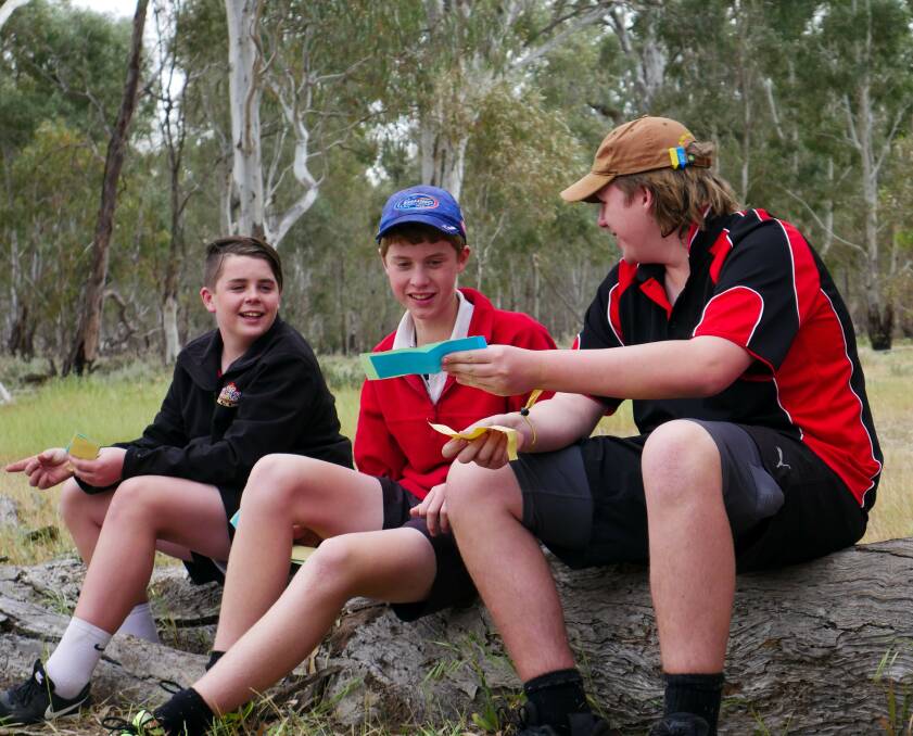 HANDS-ON: Deniliquin High School students enjoy a field activity organised with the Petaurus Education Group. The Burrumbuttock-based group is teaming up with the MDBA for a pilot education program called 'Basin Heroes'.