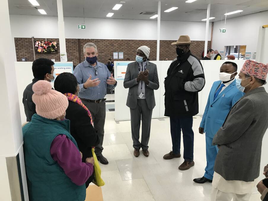 WALK-THROUGH: Leaders of diverse cultural groups including Clement Rwumbuguza (front) were taken through the Albury Wodonga Health vaccine hub on Wednesday. AWH's Mark Martin talked them through the hub's processes.