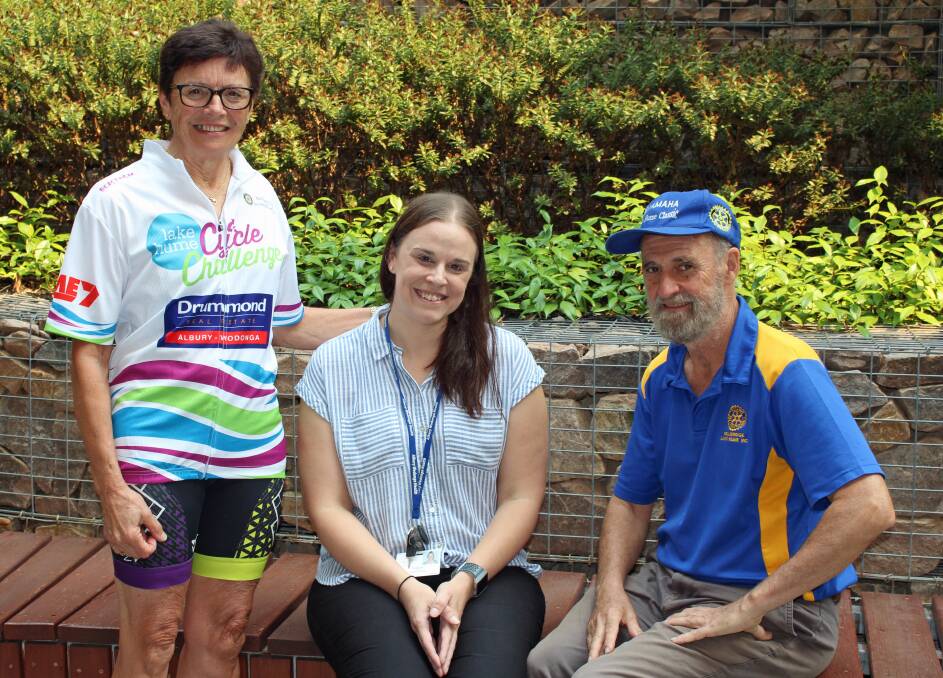 NEW ROLE: Cyclist Jenny Black, Teighan Govett, who is the new Wellness Centre co-ordinator at the Border's cancer centre, and Rotary Club of Bellbridge Lake Hume member Stuart Lucas. Picture: SALLY EVANS