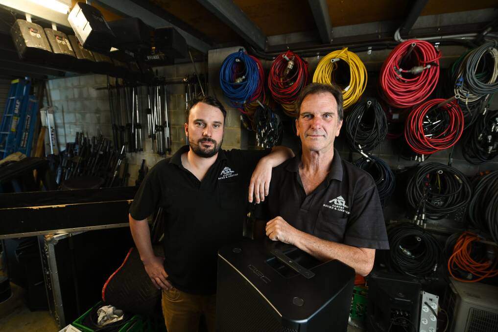 LIGHTS ON: It has been a difficult year for businesses like Albury Sound and Lighting but things are looking up for Nathan and Ross Schulz. Picture: MARK JESSER