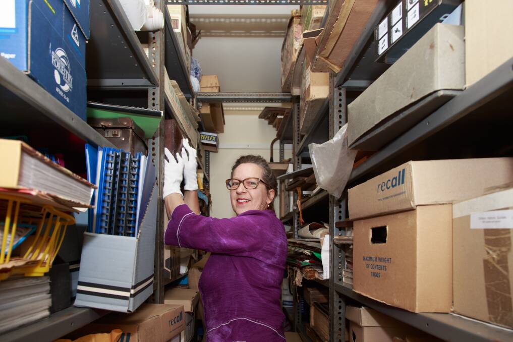 Ms Rowe says all the items needed to be documented and re-housed into non-acidic boxes. Picture: SIMON BAYLISS