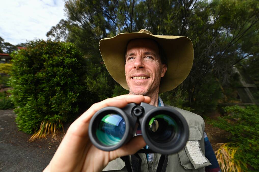 KEEN EYE: BirdLife Australia's Ben Humphries is encouraging families to get on board with the Aussie Backyard Bird Count this week. A 20-minute count can make a huge difference. Picture: MARK JESSER