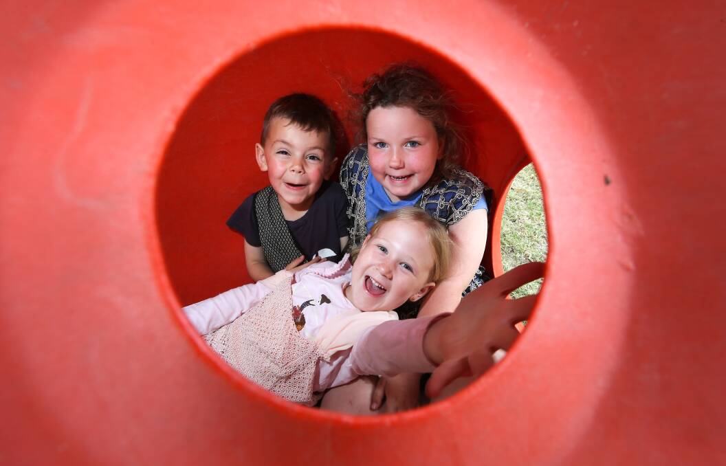 LOADS OF FUN: Max O'Halloran, 5, Hannah McGlashan, 6, and Havannah Humphreys, 6, were among the children who took part in a new vacation care program at Albury Family Day Care on Burrows Road in Lavington. Picture: KYLIE ESLER