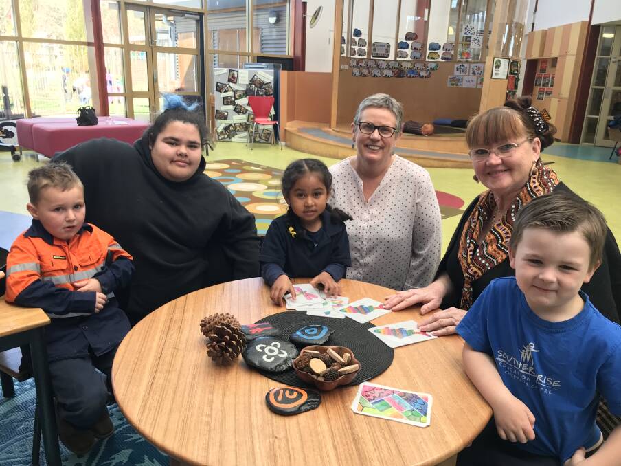 NETWORK: Seth Toll, 4, with artist Carliegh Walsh, Sophie Caroopen, 4, Nola Bales, Trish Cerminara and Alaric Wolffenbuttel at the Southern Rise Children's Centre.