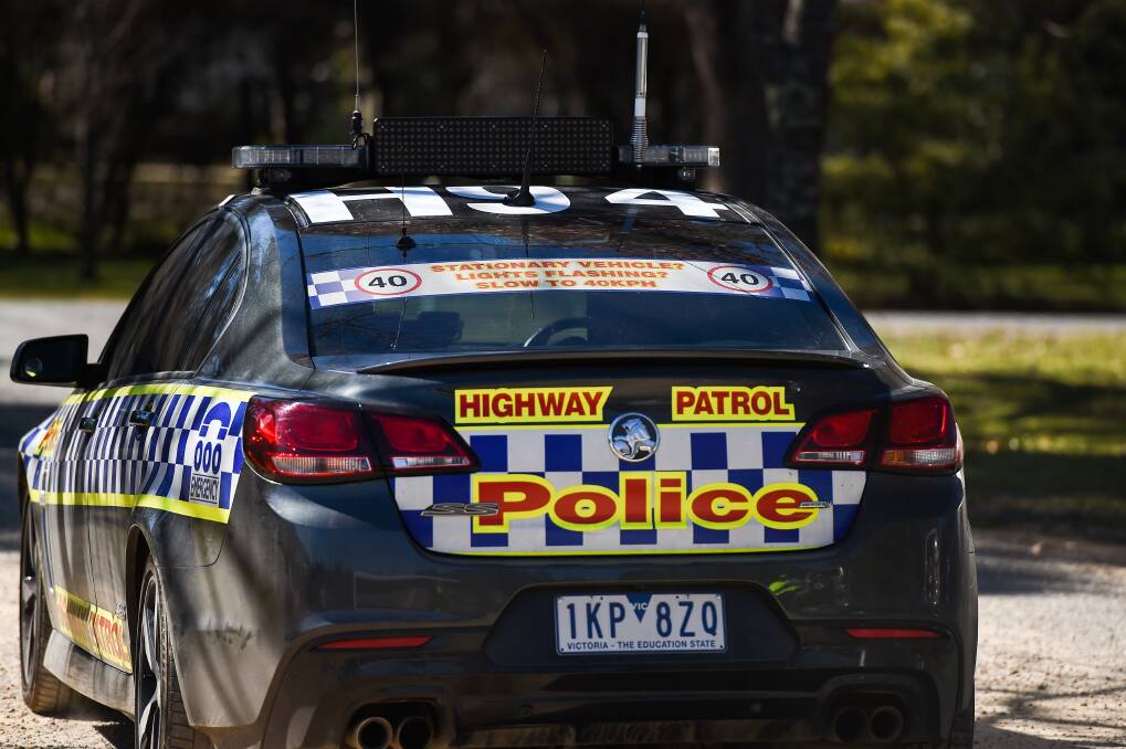 Drivers are reminded to slow to 40km/h when passing police pulled over with their lights flashing. Picture: MARK JESSER
