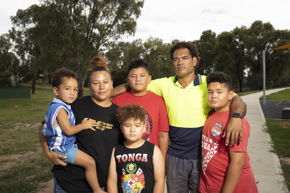 WORRIED: Ofa and Etu Uaisele and their children Sione, 2, Isikeli, 7, Richard, 12, and Feleti, 10, are waiting for news from friends and family in Tonga after the weeken's volcanic eruption. Picture: ASH SMITH