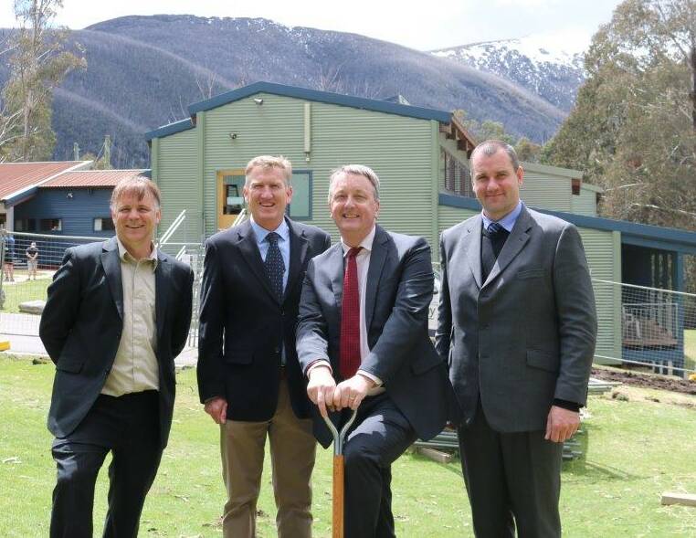 YMCA Howmans Gap manager Matthew Charles-Jones, Sport and Recreation Victoria Camps and Outdoor sector manager David Strickland, Victorian Mental Health Minister Martin Foley and Disabled WinterSport Australia chair Jim Blackburn turn the first sod at construction of Australia's first purpose-built alpine accommodation for disabled visitors.
