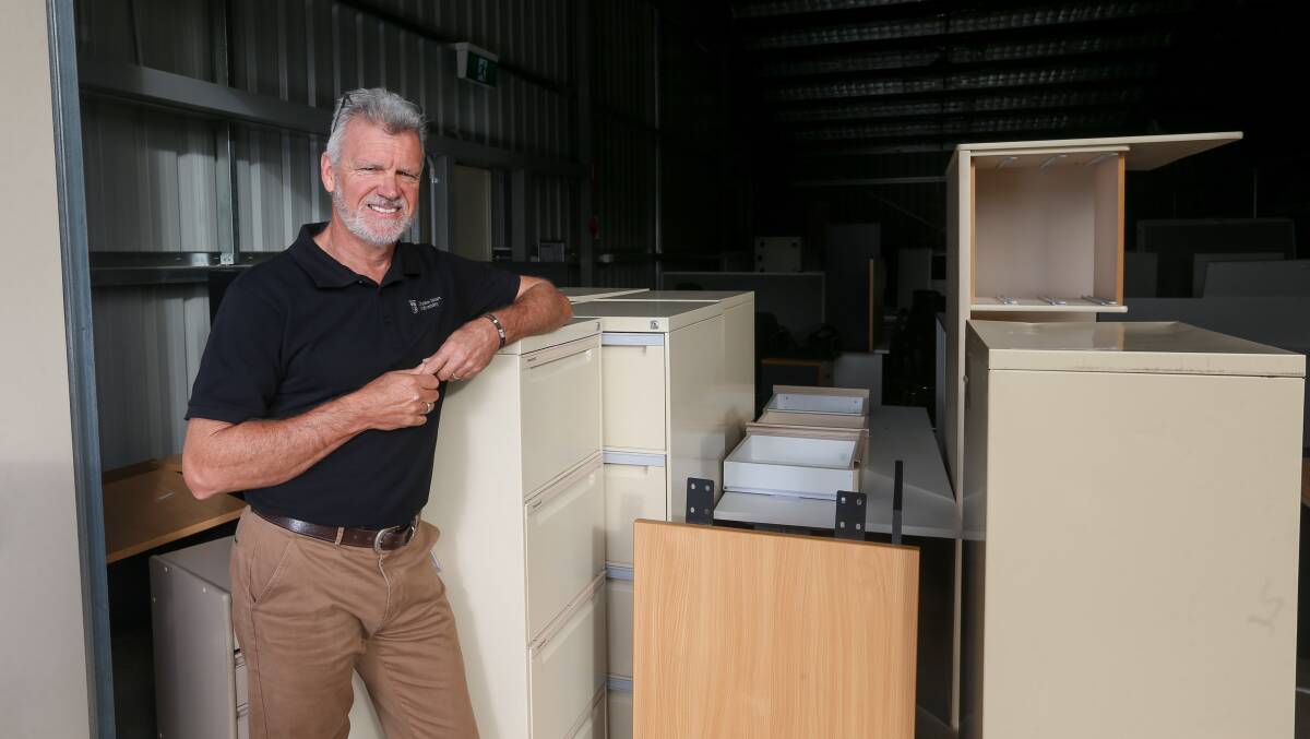 NEW PURPOSE: Charles Sturt University's Mark Evans has been involved in a program where furniture is redistributed to schools and groups. Picture: TARA TREWHELLA