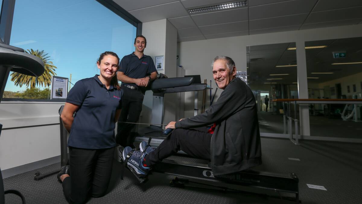 GOAL: Flex Out Physiotherapy's Emma Pargeter and Ryan Sewell have helped Wodonga's Martin Shanahan get out of a wheelchair, and he hopes to walk his daughter down the aisle. Picture: TARA TREWHELLA